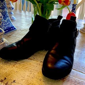 Sleek black booties.